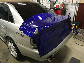 Notice the Nurburg Ring vinyl graphic that gets covered with the blue wrap to creade a ghosted image branded under the wap. Audi s4 B5 Stage 3
