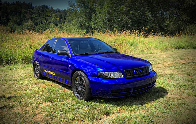 Gloss Blue Metallic wrap on Audi S4 B5 Stage 3 Wrap. Carbon filber wrap, satin matte blue wrap, reflective yellow wrap. Audi S4 B5 Stage 3 Wrap